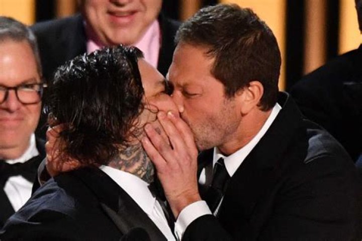 Emmys: Matty Matheson and Ebon share surprisingly long kiss on-stage after win