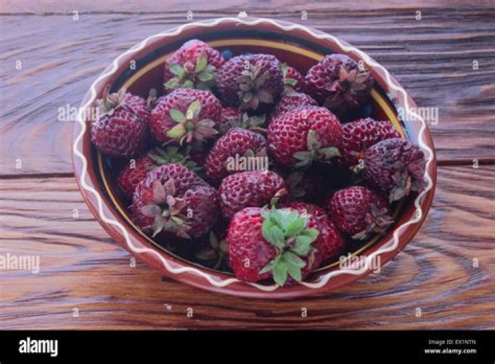 Is it OK to eat dark red strawberries?