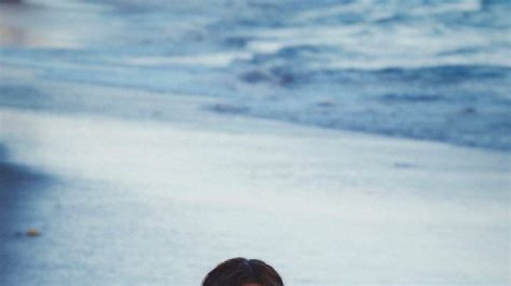 'Perfect' Megan Fox channels Ariel as she takes dip in the sea in mini-dress